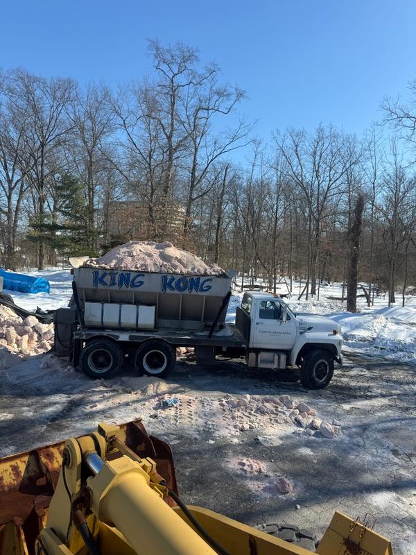 King Kong, a high-capacity Clear Landscaping salt spreader, treating a commercial site