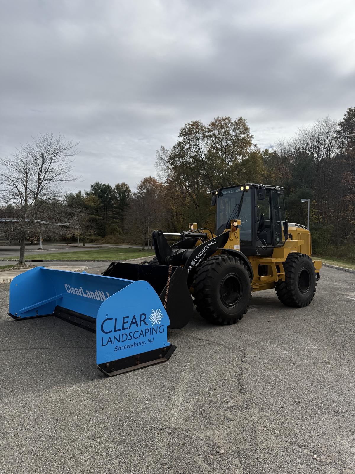 Clear Landscaping equipment clearing a commercial property in Morris County, New Jersey